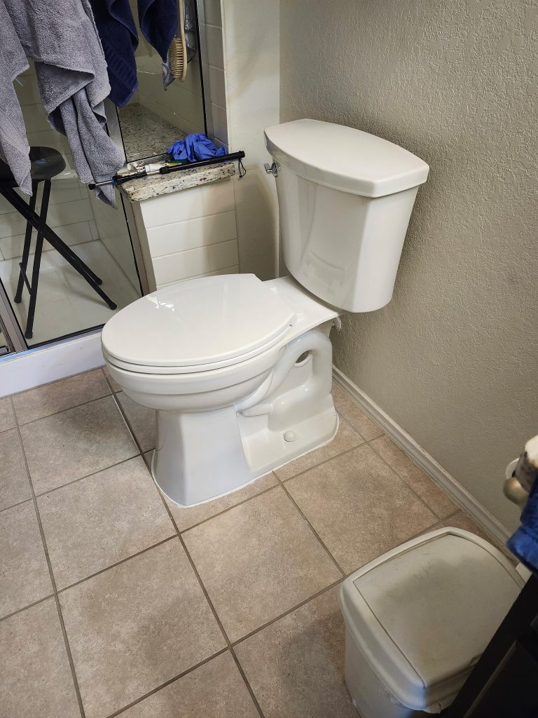Newly installed toilet in a bathroom